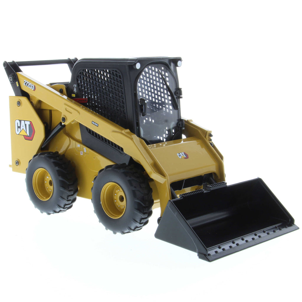 Radio Controlled Model of a CAT Yellow and Black Caterpillar 272D3 Skid Steer Loader with Standard Bucket on a White Background