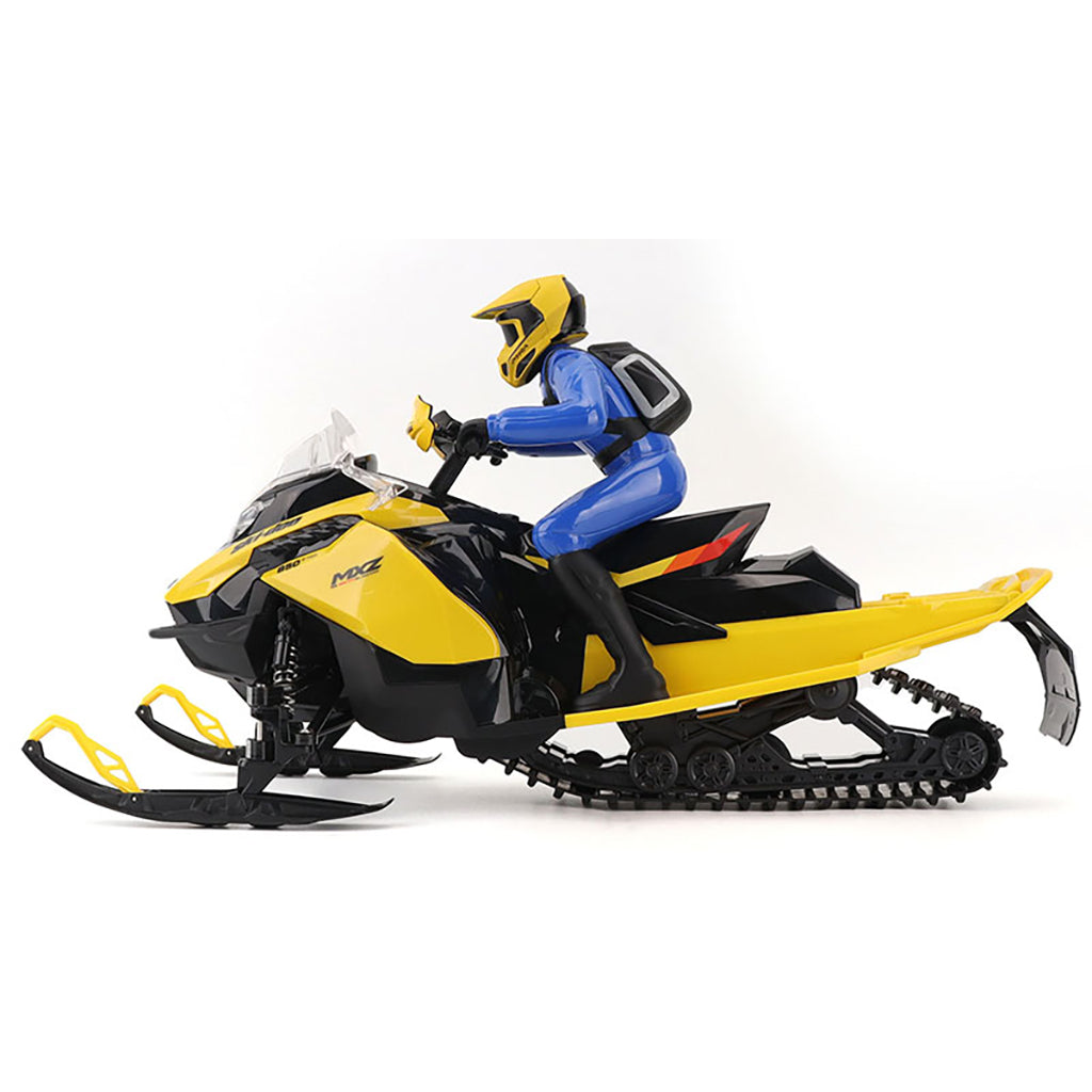 Model of a R/C Ski-Doo MXZ snowmobile with a rider on a white background