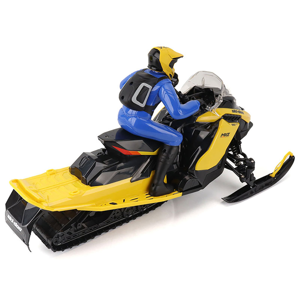 Model of a R/C Ski-Doo MXZ snowmobile with a rider on a white background