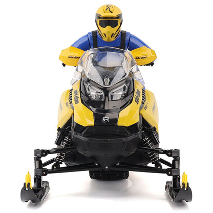 Model of a R/C Ski-Doo MXZ snowmobile with a rider on a white background