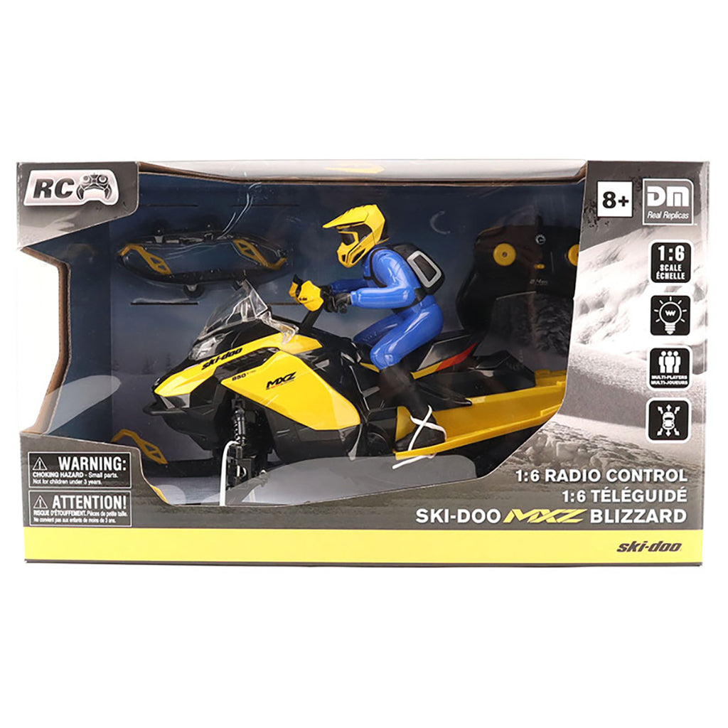 Boxed RC Ski-Doo MXZ Blizzard toy with driver figure on a white background