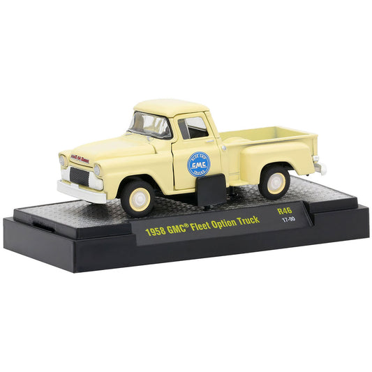 Model of a 1952 GMC Fleet Option truck on a display stand with a white background