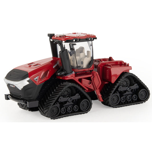 Red Case IH Steiger toy tractor with black tracks on a white background