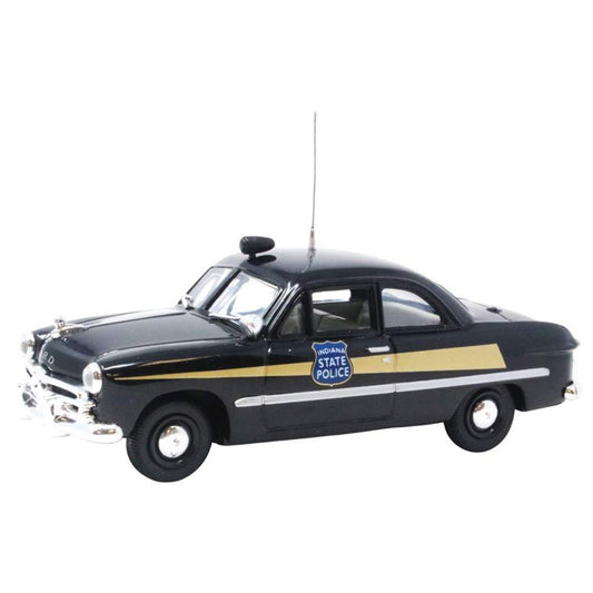 Model of a vintage police car with 'Delaware State Police' branding on a white background