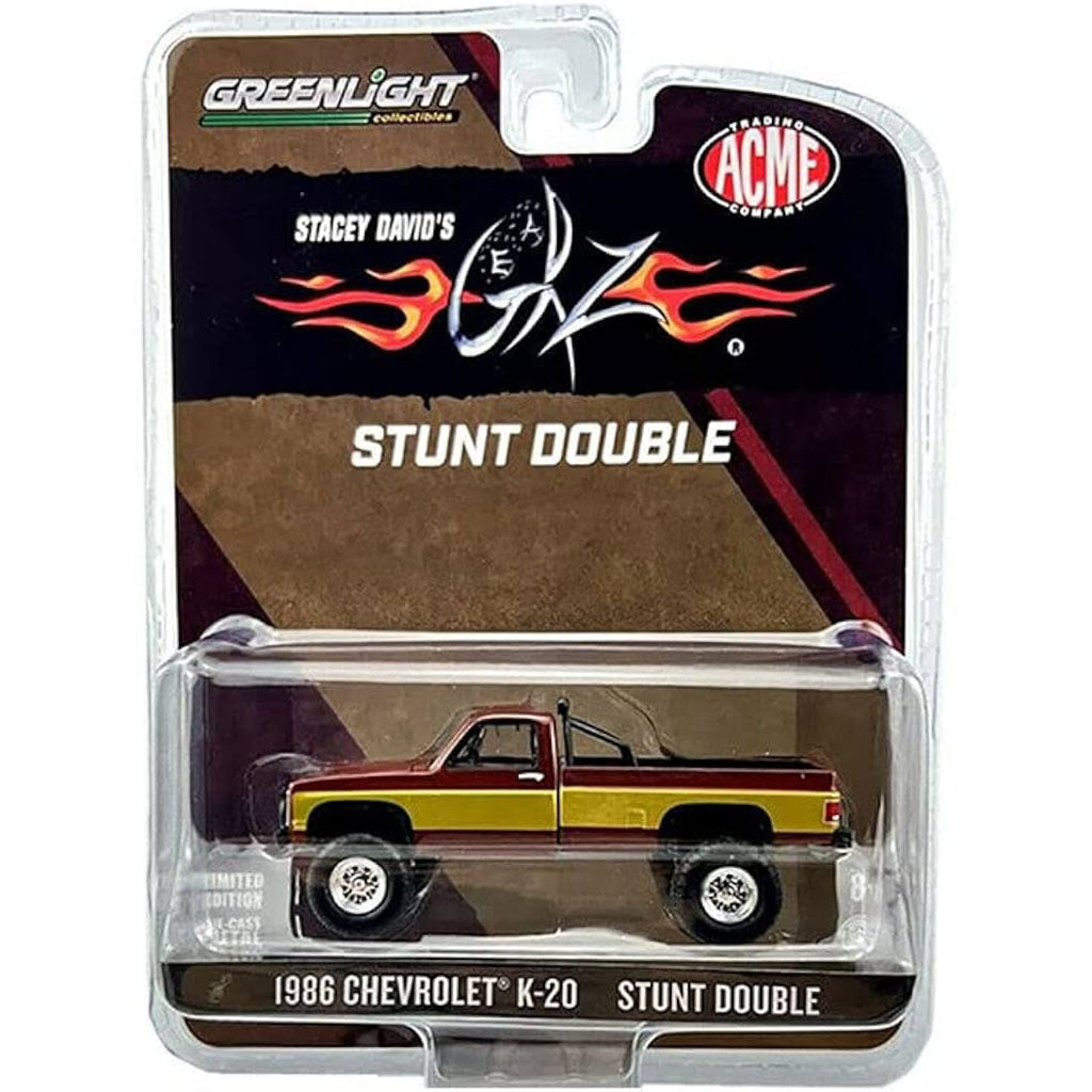 1986 Chevrolet K-20 model truck in packaging with Greenlight and ACME branding.