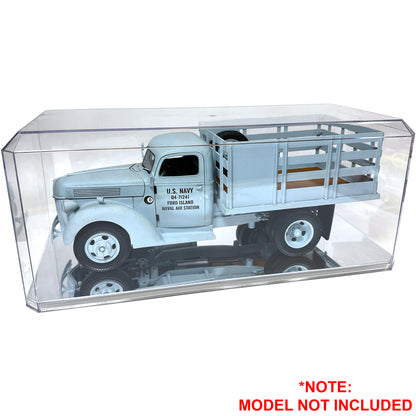 Model truck in a clear display case with U.S. Navy branding.