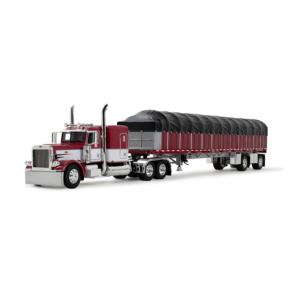 A die-cast model of a classic Peterbilt Cab-Over semi-truck with a Red and White cab, towing a long white with blue canvas-covered trailer, shown on a plain white background.