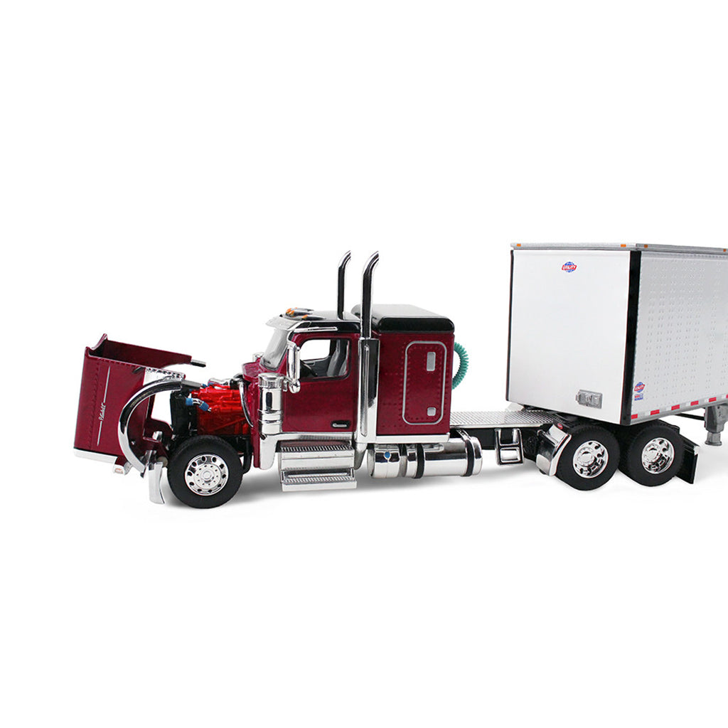 Model of a red and black Peterbilt 589 pulling a white dry van trailer on a white background