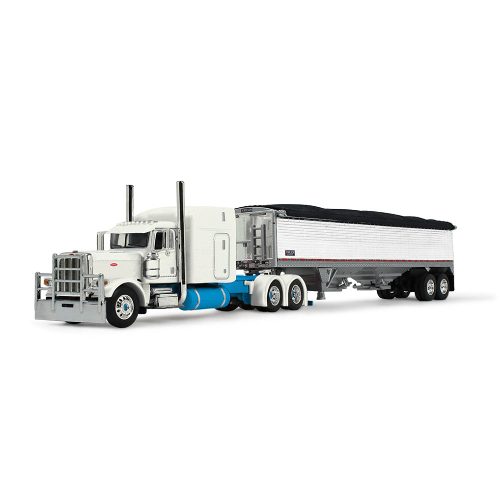 A detailed diecast model of a Peterbilt semi-truck with a white grain trailer, featuring a black cover on the rear, set against a plain white background.