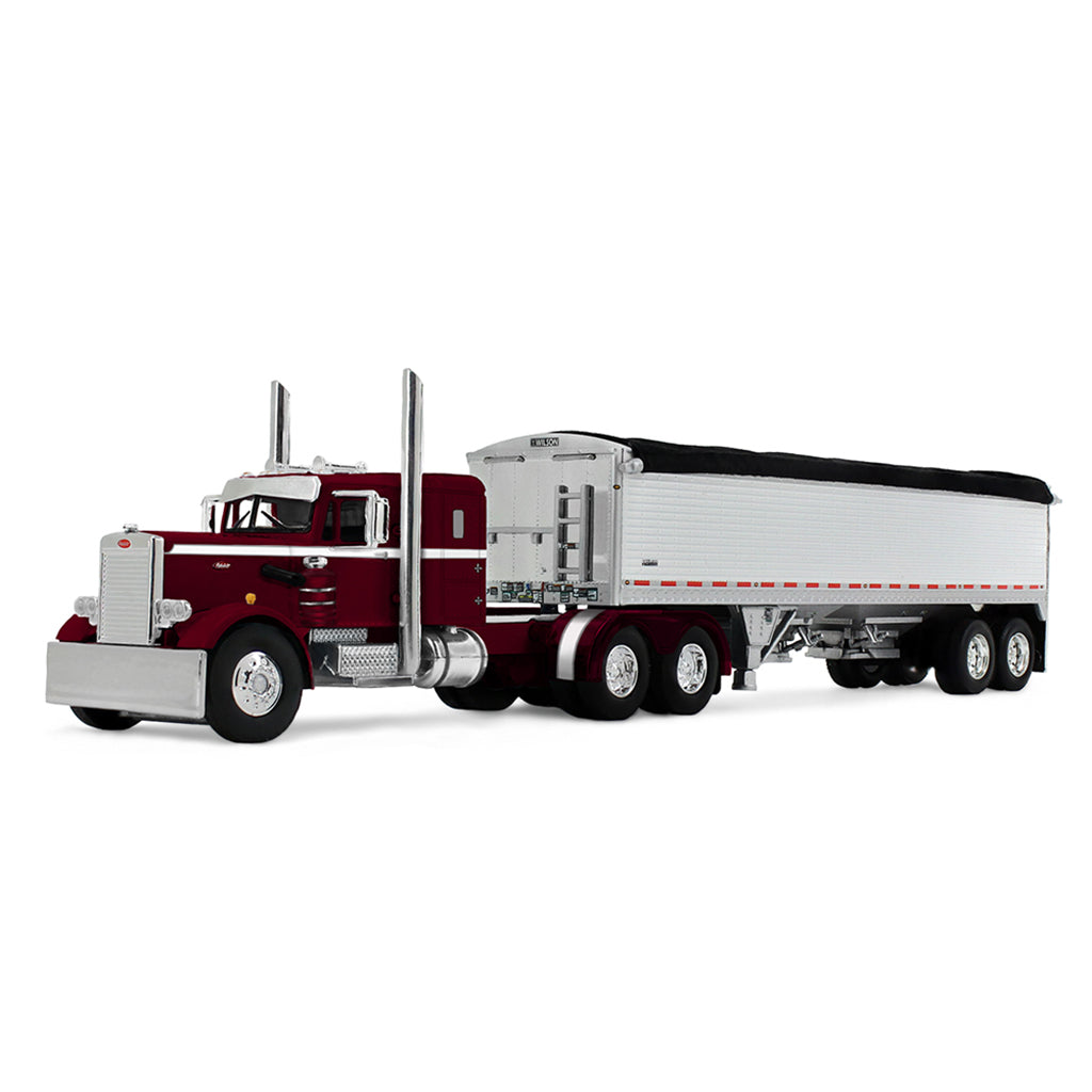 Model of a red and white truck with a trailer on a white background