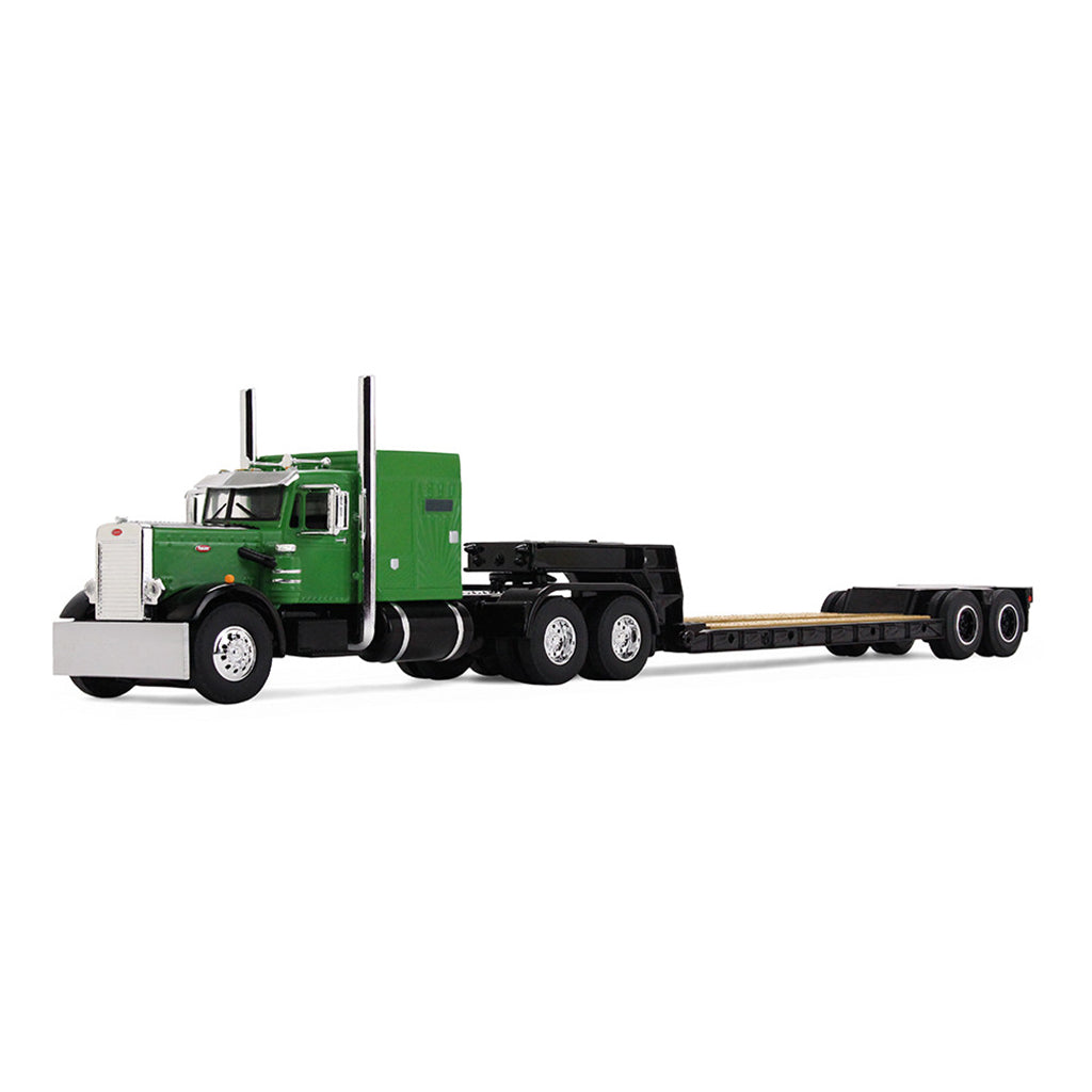 Model of a green and black truck with a lowboy trailer on a white background