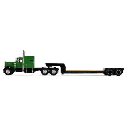 Model of a green and black truck with a lowboy trailer on a white background
