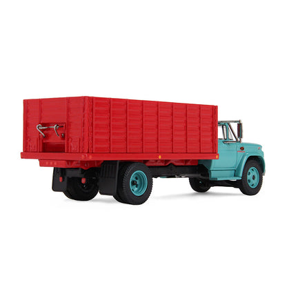 An turquoise GMC grain truck model with a red grain bed and turquoise wheels, shown on a clean white background.