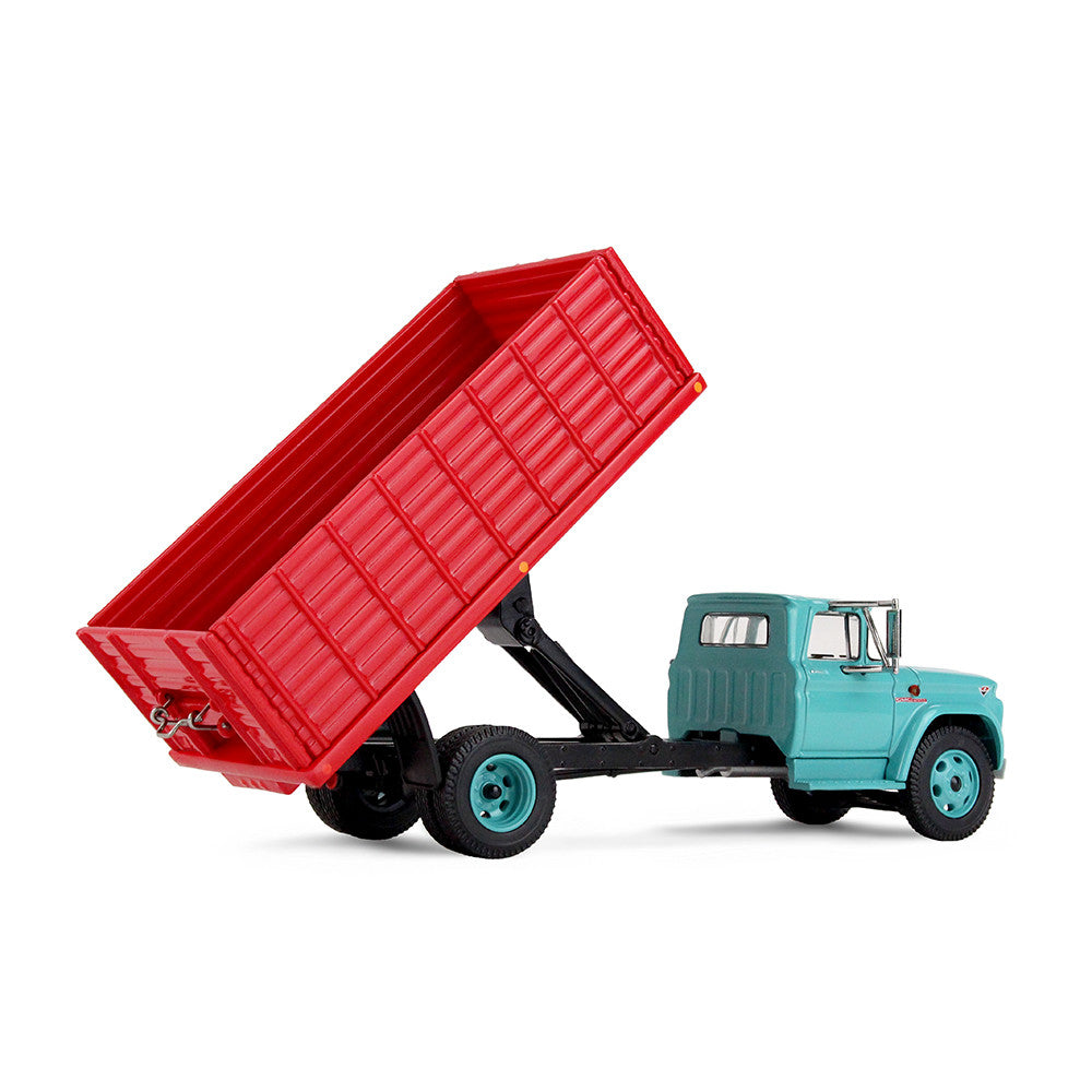 An turquoise GMC grain truck model with a red grain bed and turquoise wheels, shown on a clean white background.