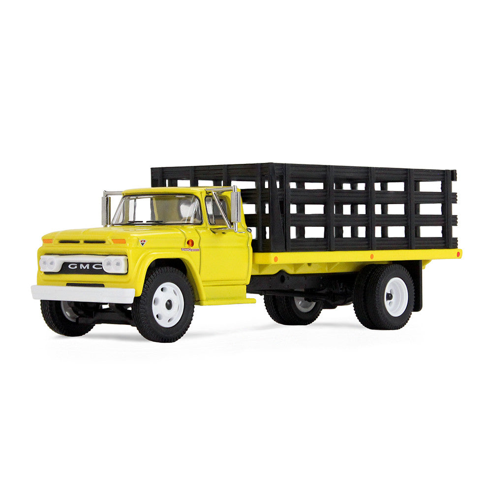 A yellow vintage GMC stake truck with a black slatted cargo bed on a clean white background.