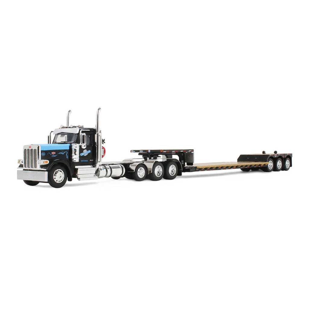 Model of a Peterbilt 589 Tractor pulling a Machinery Lowboy Trailer in Black and Blue Paint on a White Background