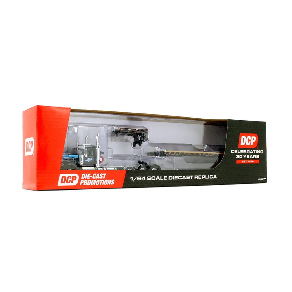 A 1/64 scale diecast replica of a semi-truck cab with a tanker trailer, shown inside its original red and black DCP retail packaging on a white background.