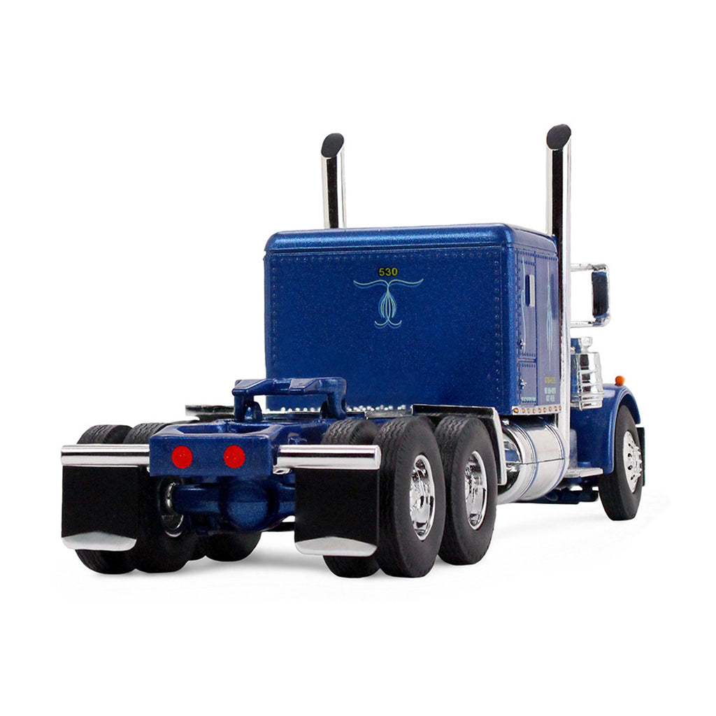 A die-cast model of a Peterbilt semi-truck with a white refrigerated trailer carrying Western Distributing, shown on a clean white background.