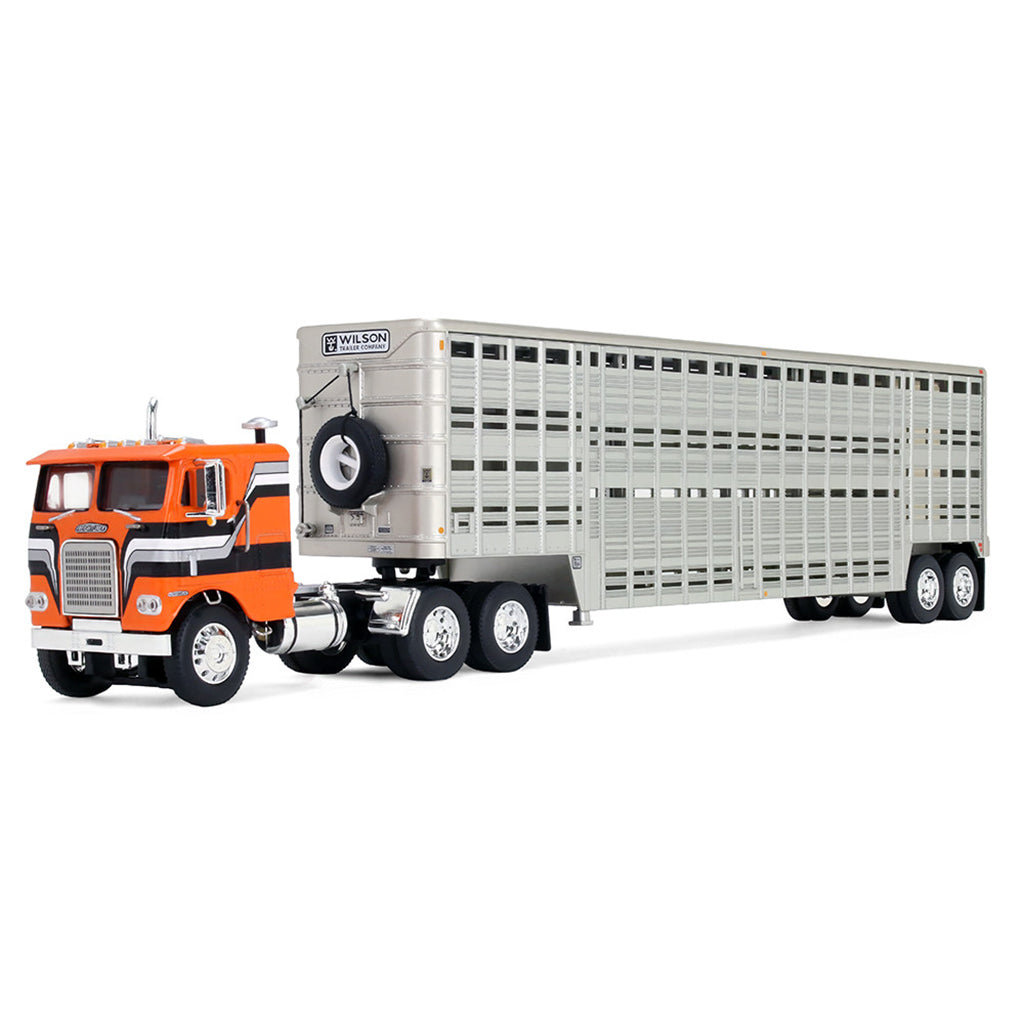 Model truck with an orange cab and gray trailer on a white background