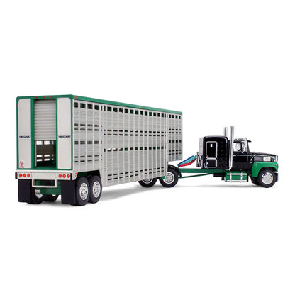 A die-cast model of a green and black semi-truck towing a silver livestock trailer with a green roof, shown on a plain white background.