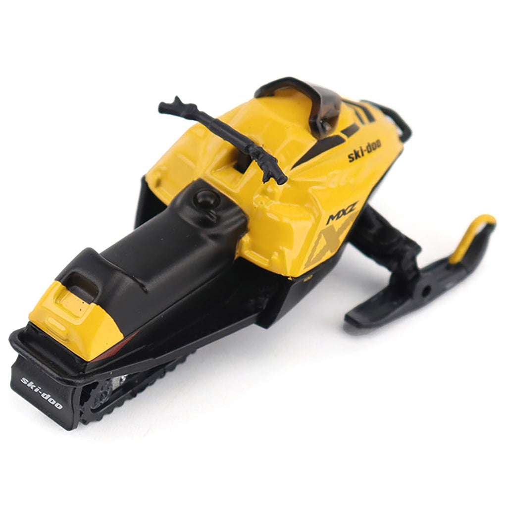 Toy snowmobile model with yellow and black colors on a white background