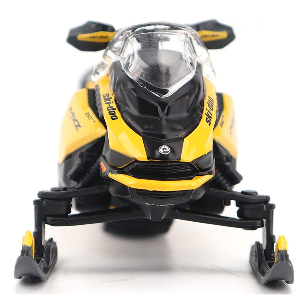 Model of a yellow and black snowmobile on a white background