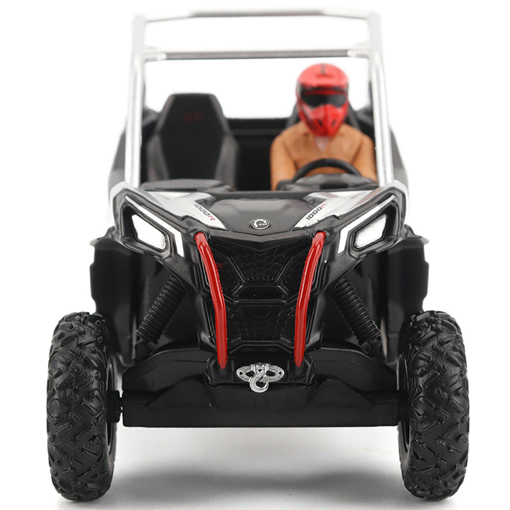 Model of a black and red off-road vehicle with a person inside on a white background