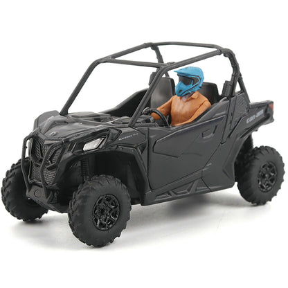 Model of a black off-road vehicle with a figure inside on a white background