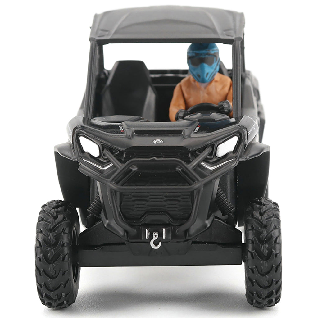 Model of a black off-road vehicle with a person inside on a white background