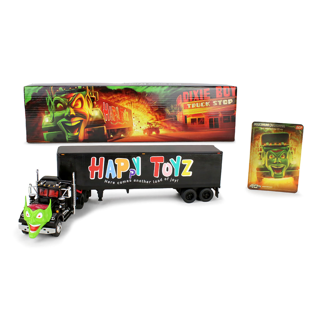 A Happy Toyz brand toy semi-truck set featuring a black semi-trailer with colorful 'HAPPY TOYZ' lettering, a green cartoon-faced cab, the printed retail box, and a small collectible card on a white background.
