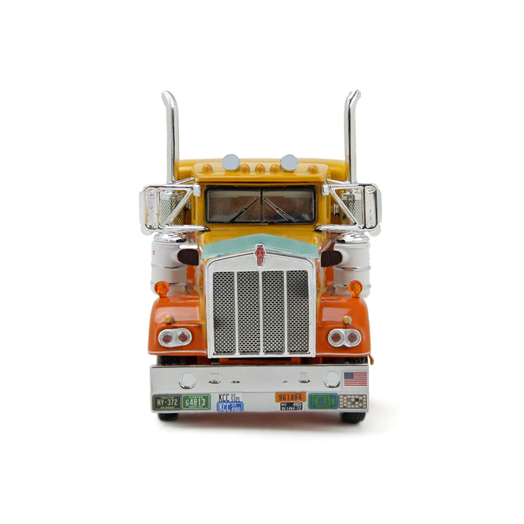 1:64th scale yellow, white, and orange model photographed on a clean white background