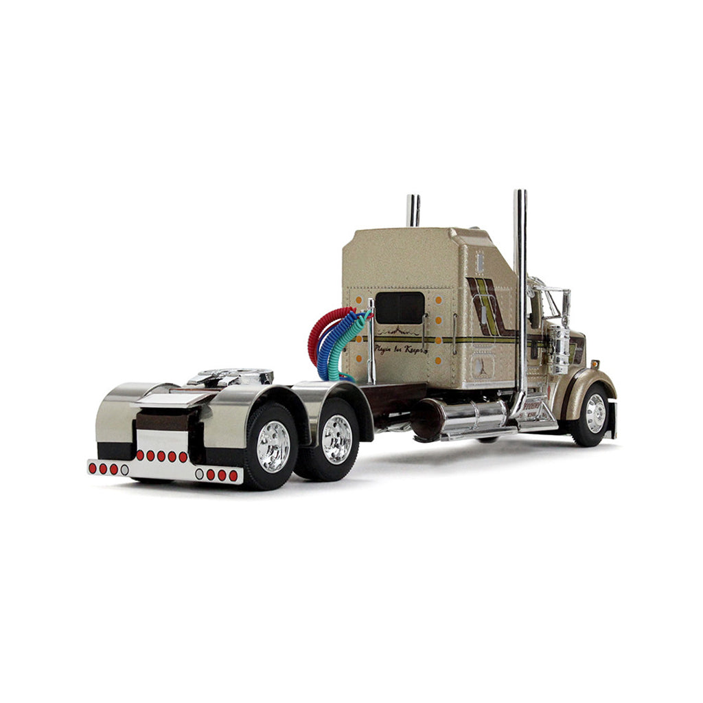 A detailed diecast model of a semi-tractor shown on a clean white background.