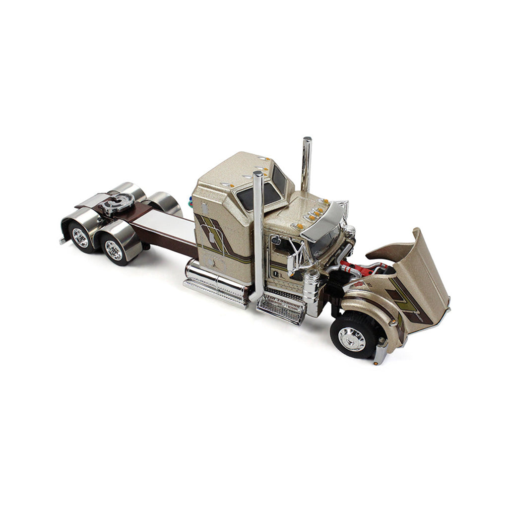 A detailed diecast model of a semi-tractor shown on a clean white background.