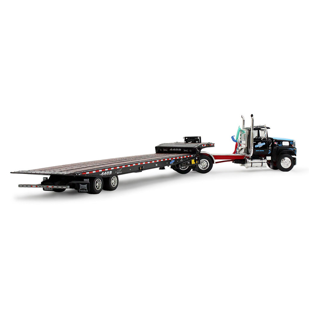 Model truck with a flatbed trailer on a white background