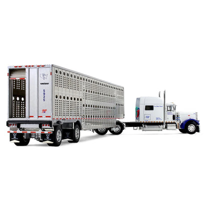 A diecast model of a Peterbilt semi-truck with a silver livestock carrier trailer, featuring blue accents on the cab and 'National Carriers' branding on the trailer, set against a plain white background.