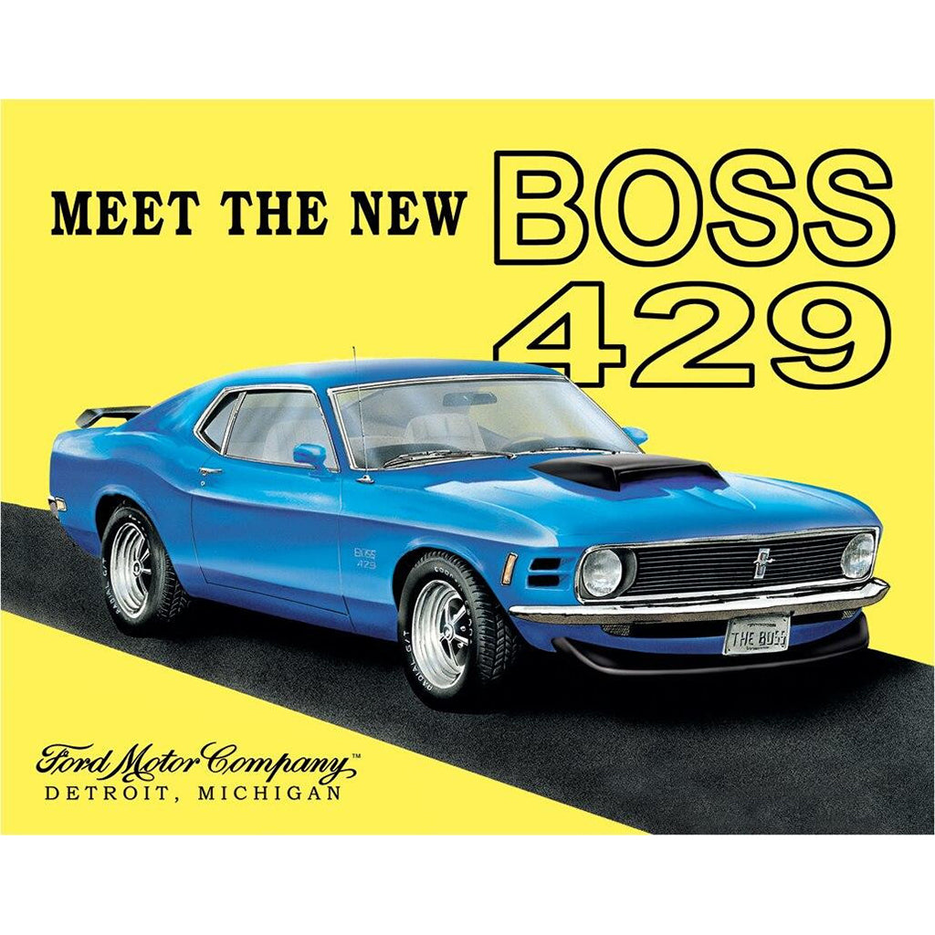 Blue Ford Mustang Boss 429 on a yellow background with text 'Meet the New Boss 429' and 'Ford Motor Company, Detroit, Michigan'.