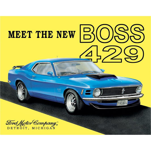 Blue Ford Mustang Boss 429 on a yellow background with text 'Meet the New Boss 429' and 'Ford Motor Company, Detroit, Michigan'.