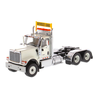 1:50 Scale Diecast Model of a White International HX520 Tandem-Axle Day Cab Tractor on a White Background
