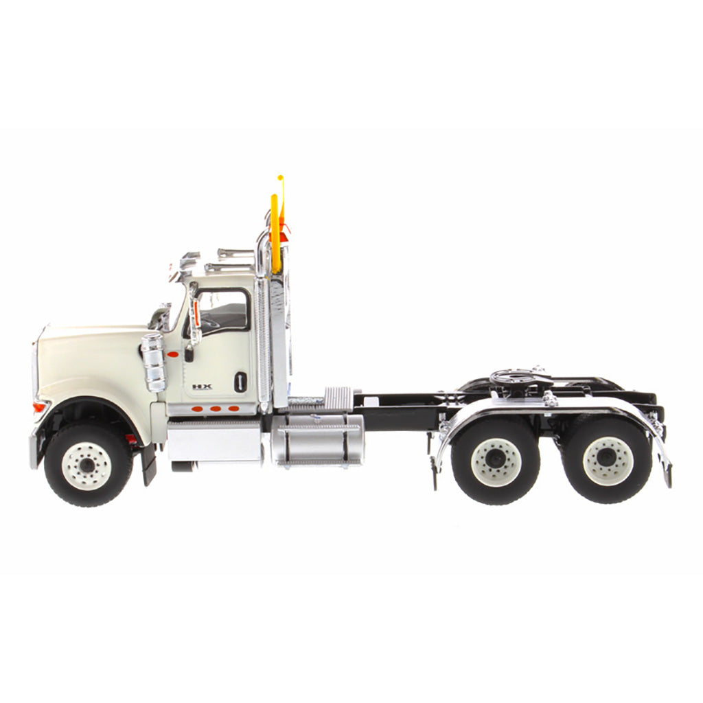 1:50 Scale Diecast Model of a White International HX520 Tandem-Axle Day Cab Tractor on a White Background