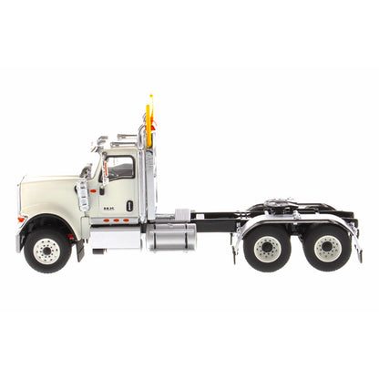 1:50 Scale Diecast Model of a White International HX520 Tandem-Axle Day Cab Tractor on a White Background