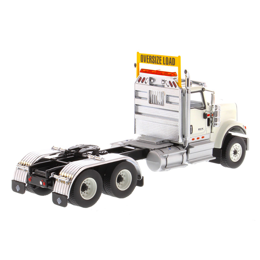 1:50 Scale Diecast Model of a White International HX520 Tandem-Axle Day Cab Tractor on a White Background