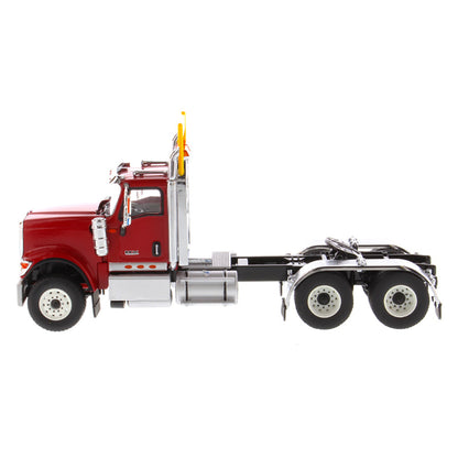 1:50 Scale Diecast Model of a Red International HX520 Tandem-Axle Day Cab Tractor on a White Background