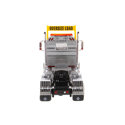 1:50 Scale Diecast Model of a Red International HX520 Tandem-Axle Day Cab Tractor on a White Background