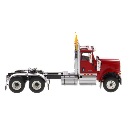 1:50 Scale Diecast Model of a Red International HX520 Tandem-Axle Day Cab Tractor on a White Background