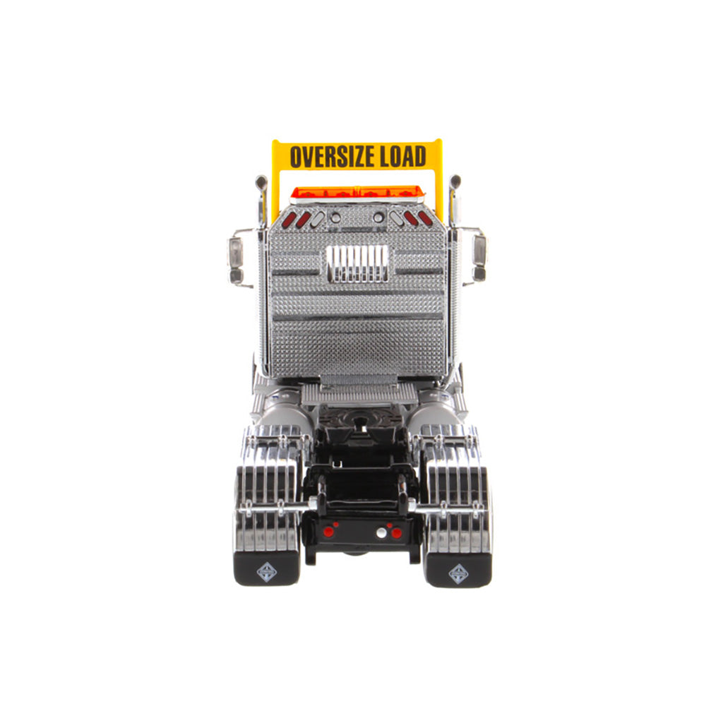 1:50 Scale Diecast Model of a Black International HX520 Tandem-Axle Day Cab Tractor on a White Background