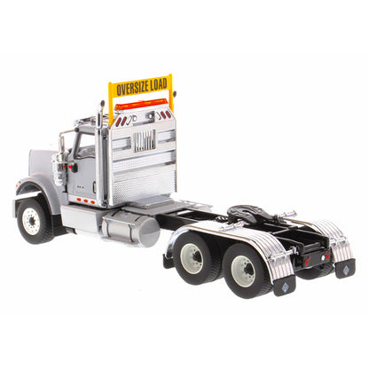 1:50 Scale Diecast Model of a Light Gray International HX520 Tandem-Axle Day Cab Tractor on a White Background