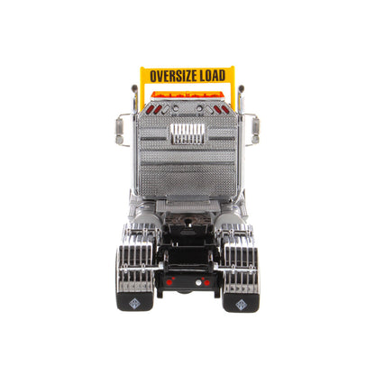 1:50 Scale Diecast Model of a Light Gray International HX520 Tandem-Axle Day Cab Tractor on a White Background