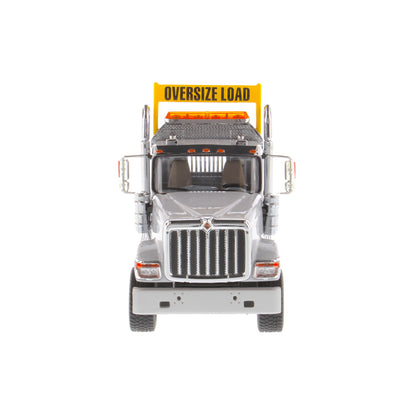 1:50 Scale Diecast Model of a Light Gray International HX520 Tandem-Axle Day Cab Tractor on a White Background