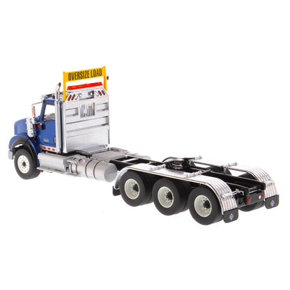 1:50 Scale Diecast Model of a Metallic Blue International HX620 Tri-Axle Day Cab Tractor on a White Background