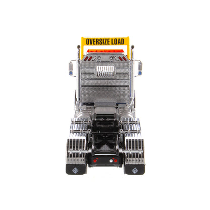 1:50 Scale Diecast Model of a Metallic Blue International HX620 Tri-Axle Day Cab Tractor on a White Background